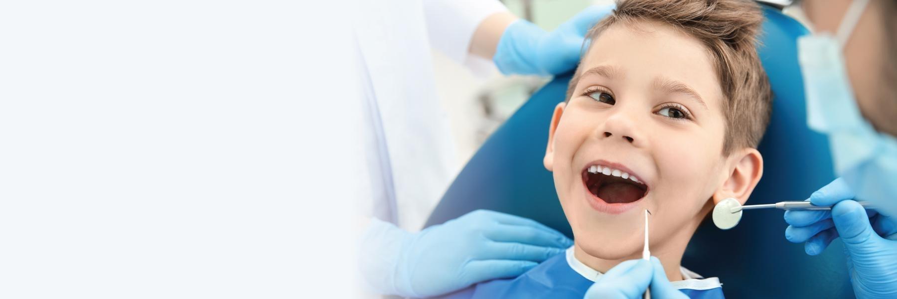 young boy getting dental treatment l pediatric dentistry wylie